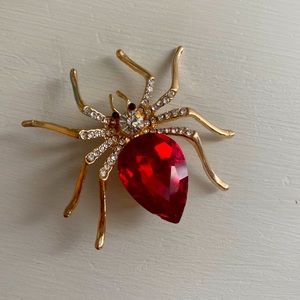 Halloween spider pin. Gold.  Red and clear stones.